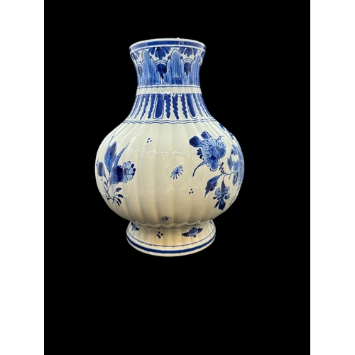 590 - European Ceramics: Dutch Delft ribbed bulbous vase painted with birds and flowers, remains of a reta... 