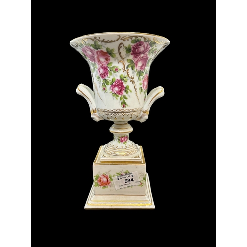 594 - Ceramics: Rose painted Campagna urn with lid. 23cm.