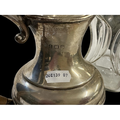 658 - Hallmarked Silver: Hot water jug of compressed baluster form, Birmingham 1919, 16½cm high, 15.8ozt. ... 