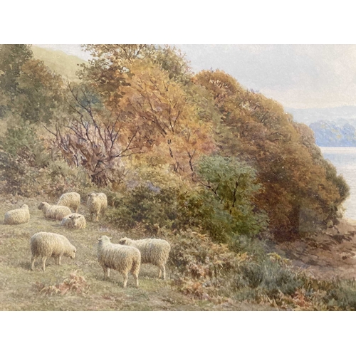 203 - Frederick Williamson (British 1835-1900): Watercolour, sheep grazing by a river. 9ins. x 14ins.... 