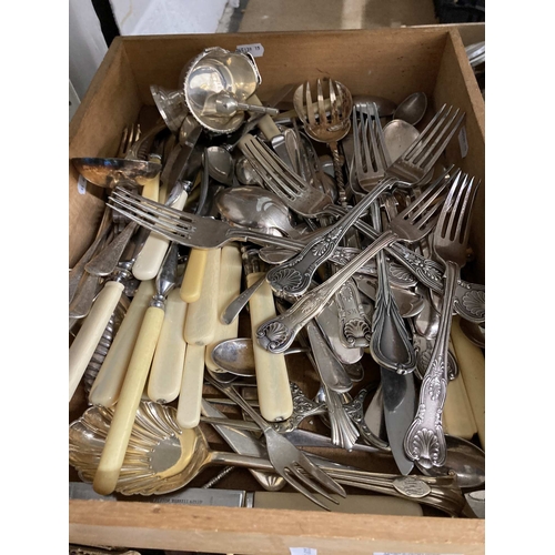 22 - Silver Plate: Assortment of silver plated and other cutlery to include spoons, forks, lad;es, nutcra... 