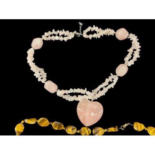 263 - Costume Jewellery: Rose quartz and amethyst bead necklace a rose quartz necklace with a heart-shaped... 