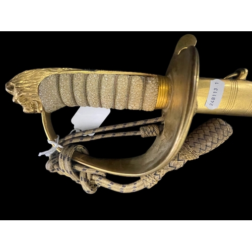 268 - Militaria: Early 20th cent. Royal Naval Officer's Dress Sword with lion head pommel, wire bound shag... 