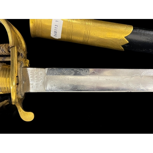 268 - Militaria: Early 20th cent. Royal Naval Officer's Dress Sword with lion head pommel, wire bound shag... 