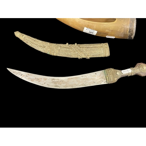 269 - 20th cent. Tribal Jambiya dagger white metal encrusted scabbard, 15½ins. Plus a white metal topped h... 