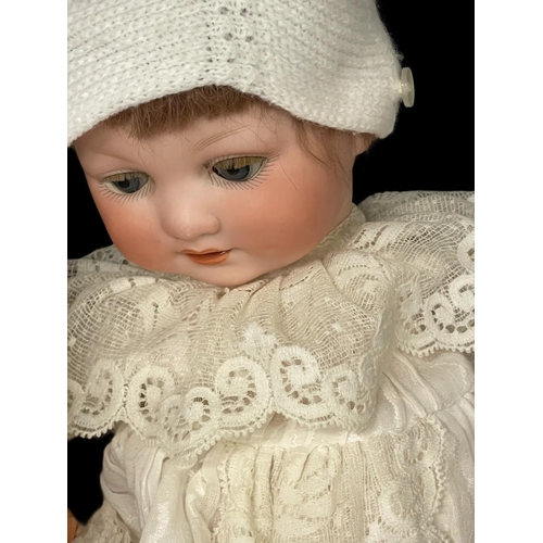 339 - Dolls: German made by Armand Marseille c1900, bisque socket head, blue glass eyes, open mouth, two u... 