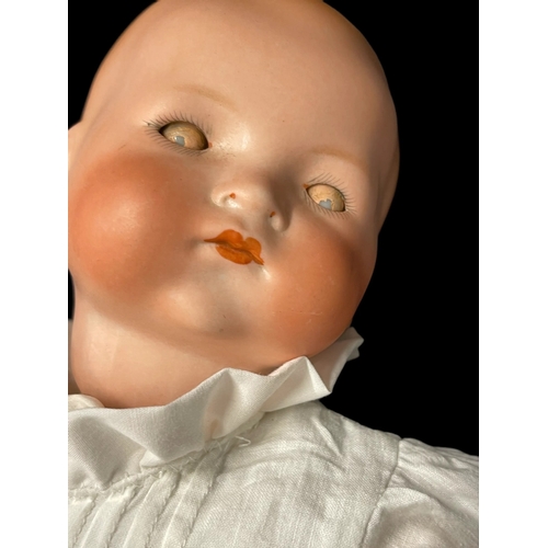 358 - Dolls: German made by Armand Marseille c1924/25, bisque socket head, weighted blue glass eyes, close... 