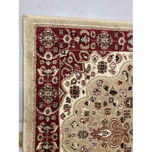 36 - Rugs & Carpets: 20th cent. Persian beige ground runner with three stylised stars. 32ins. x 117ins.... 