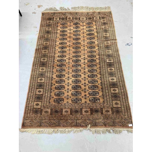 38 - Rugs: 20th cent. Tan ground Bokhara rug. 52ins. x 81ins.