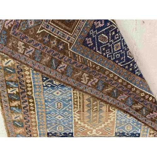 39 - Rugs: Caucasian handwoven rug c1910-1920 brown/blue ground, hand-knotted, soft pile. 80cm x 135cm.... 