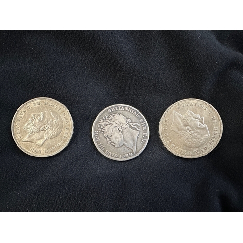 451 - Numismatics/Coins: George III silver Crown dated 1821, worn condition, together with silver George V... 