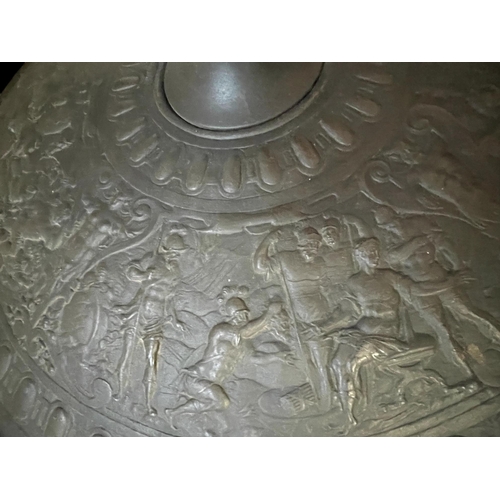 470 - 19th cent. Elkington Neo-Classical shield with embossed band depicting Romano Greco figures with gad... 