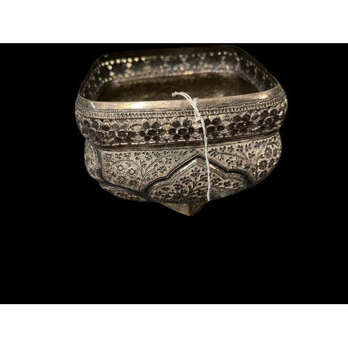 526 - Early 20th cent. Indian white metal bowl highly decorated on raised square base.