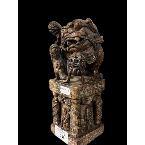 538 - Chinese: Large Chinese soapstone seal carved with fo dogs above a temple pillar flanked by figures, ... 