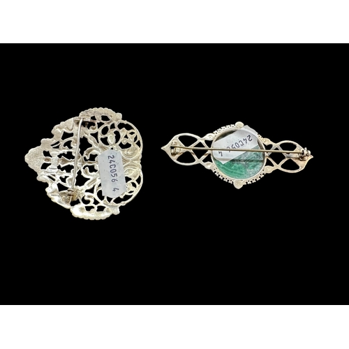 684 - Silver: Silver scorpion malachite mounted brooch together with a silver nurse's buckle converted int... 