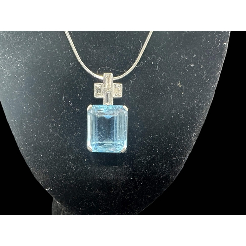 761 - Hallmarked Gold: 18ct white gold pendant set with four baguette-cut diamonds above an aquamarine. Gr... 