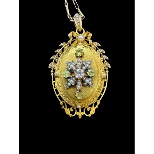 796 - Jewellery: Victorian yellow metal locket tests as 18ct gold, set with a central diamond within an ap... 