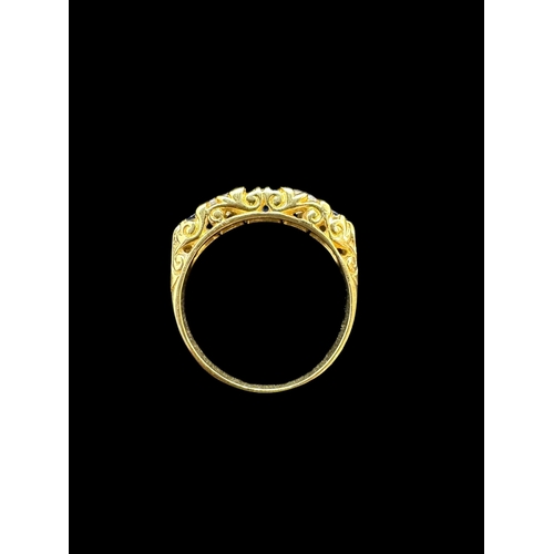 812 - Jewellery: Yellow metal ring set with two diamonds and three sapphires, the diamonds each approximat... 