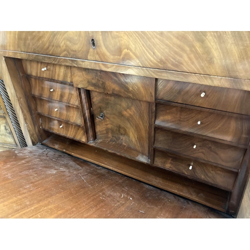 84 - Furniture: 19th cent. Walnut Empire style secretaire two drawers, one baize lined, over a drop flap ... 