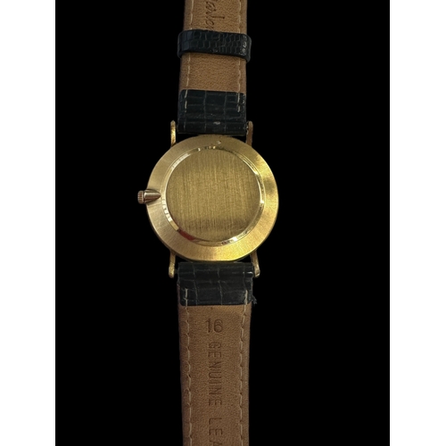 847 - Watches: Rolex Gold ultra slim, case stamped 750, later black leather strap.