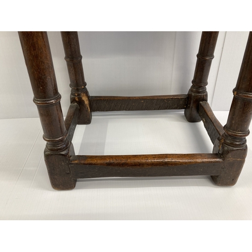 108 - Furniture: Late 17th/early 18th cent. Joint stool with gun barrel supports.