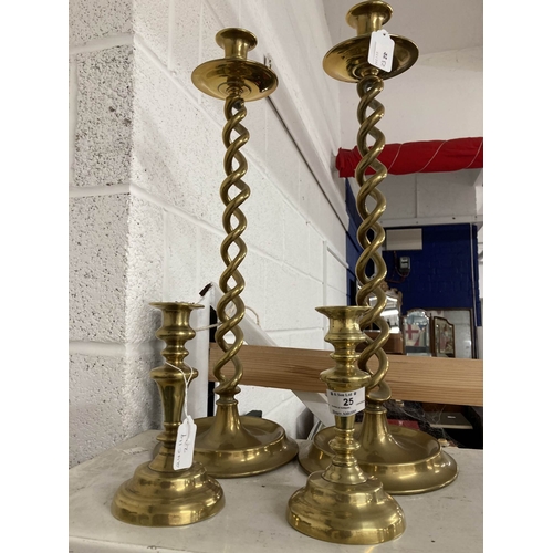 25 - Early 20th cent. Brass candlesticks open twist on cast base, 20ins. Plus a small pair, 7ins.... 