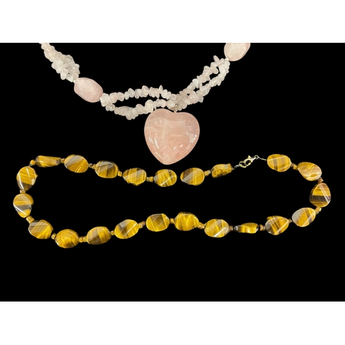 263 - Costume Jewellery: Rose quartz and amethyst bead necklace a rose quartz necklace with a heart-shaped... 