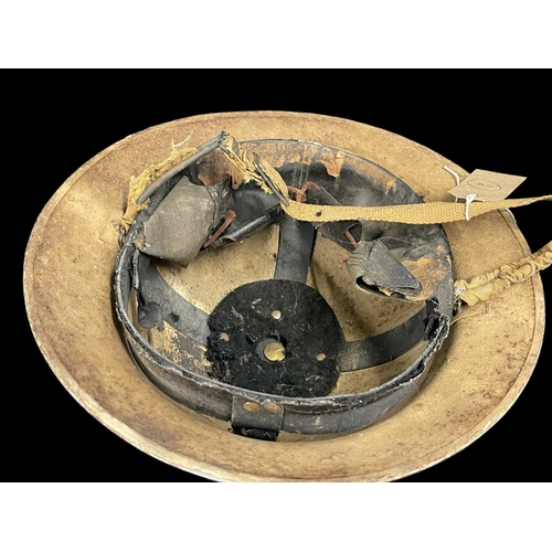 275 - Militaria: WWII South African Army helmet in Desert paintwork.