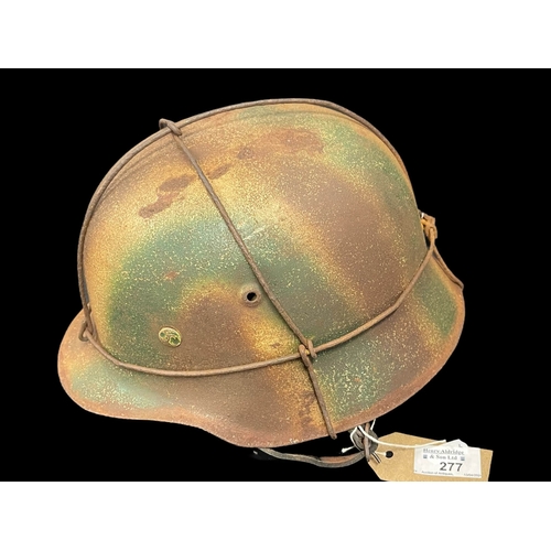 277 - Militaria: Third Reich WWII German Army M42 Pattern steel helmet, Normandy camouflage paintwork.
Ple... 