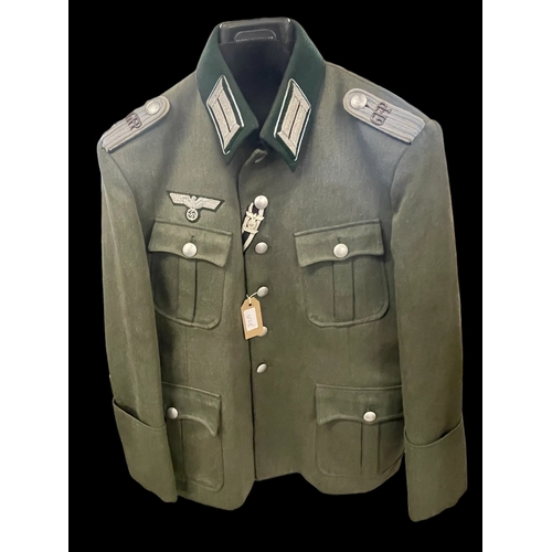 312a - Militaria: Third Reich WWII German Army Officers tunic, a museum quality replica.
Please note we do ... 