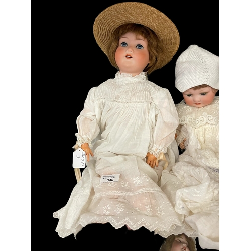 340 - Dolls: German made by Armand Marseille c1905, bisque socket head, weighted blue glass eyes, open mou... 