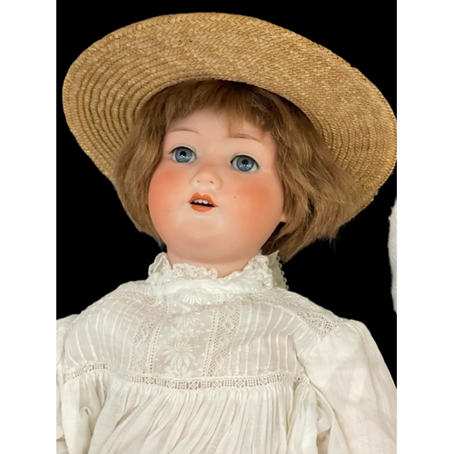 340 - Dolls: German made by Armand Marseille c1905, bisque socket head, weighted blue glass eyes, open mou... 