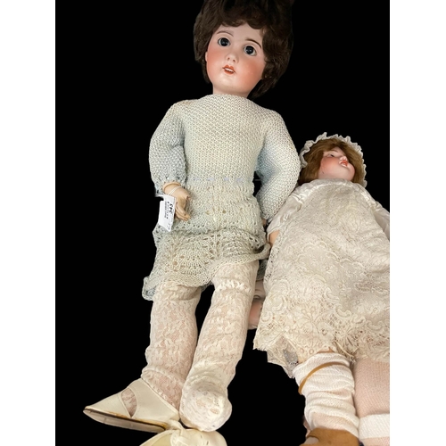 343 - Dolls: French made by S.F.B.J c1910, bisque socket head, weighted black glass eyes, open mouth, six ... 