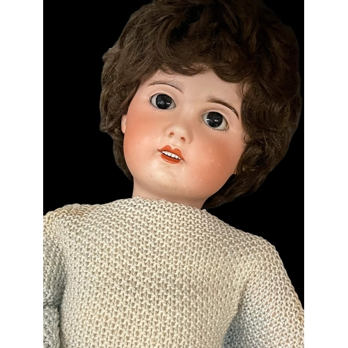 343 - Dolls: French made by S.F.B.J c1910, bisque socket head, weighted black glass eyes, open mouth, six ... 