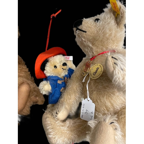 384 - Toys: Steiff Paddington Bear ornament, blue coat, red hat, boxed.