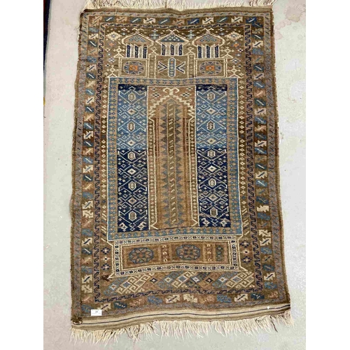 39 - Rugs: Caucasian handwoven rug c1910-1920 brown/blue ground, hand-knotted, soft pile. 80cm x 135cm.... 