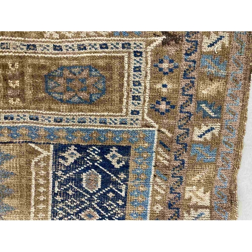 39 - Rugs: Caucasian handwoven rug c1910-1920 brown/blue ground, hand-knotted, soft pile. 80cm x 135cm.... 