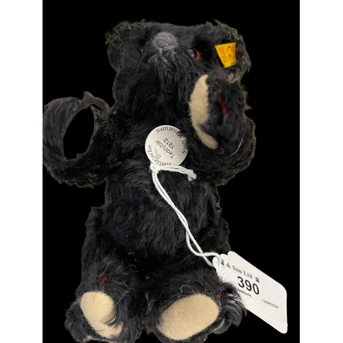 390 - Steiff Toys: Miniature black bear, label, 1912. 6ins.