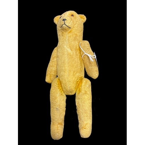 395 - Teddy Bears: 1920-1930 teddy bear, straight neck, glass eyes, straw stuffed with articulated arms an... 