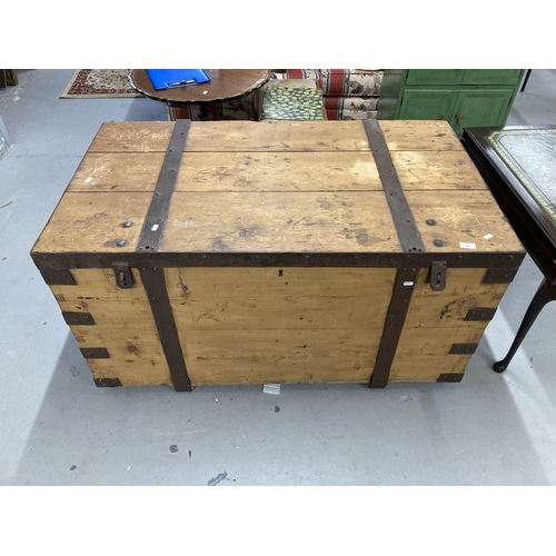 45 - Nautical: 19th cent. Steel-bound pitch pine sea chest with 19th century carriage label. 48ins. x 28i... 