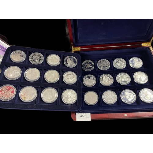 455 - Coins: Cased set of silver proof coins from Commonwealth countries of various denominations. 24 coin... 