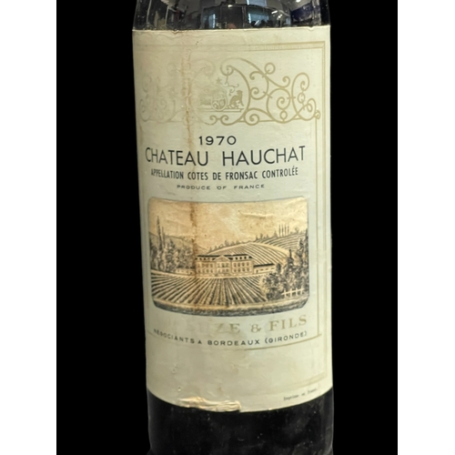 479 - Wines: Chateau Hauchat Bordeaux 1970, appellation Cotes de Fronsac Controlle with paper labels and s... 