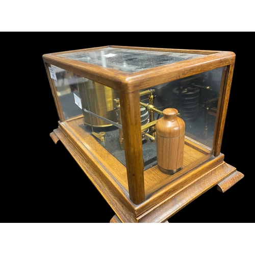 485 - Mid 20th cent. Barograph, unsigned, oak and glass case. 12ins. x 7ins. x 6ins.