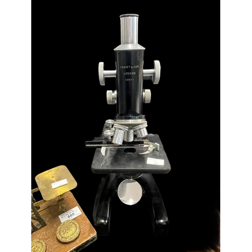 488 - Scientific Instruments: Microscope, J. Swift, triple lens, black lacquered No. 25977, 15ins. Brass s... 