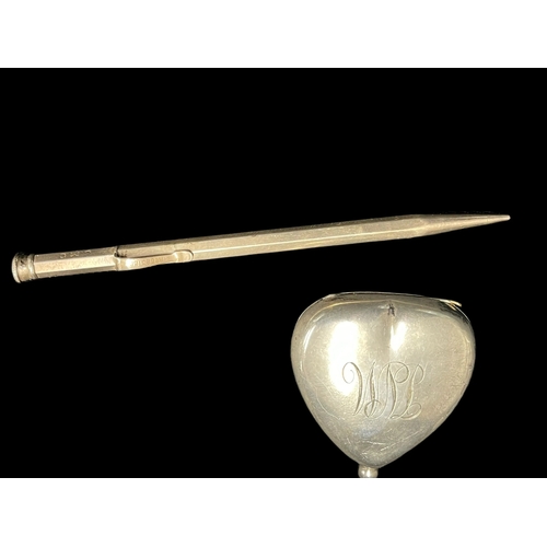 545 - Hallmarked Silver: S. Mordan Everpoint propelling pencil, London 1927, together with a heart shaped ... 