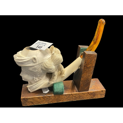 548 - Smoking Requisites: 19th cent. Meerschaum pipe with amber mouthpiece on stand. In very good overall ... 