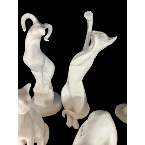 587 - Ceramics: Royal Doulton animal figures Images 'Shadow Play' (cat), 'Dedication' (bears), 'Capricorn'... 