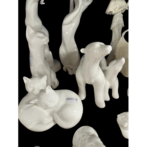 587 - Ceramics: Royal Doulton animal figures Images 'Shadow Play' (cat), 'Dedication' (bears), 'Capricorn'... 