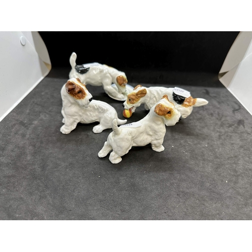 589 - Ceramics: Mid 20th cent. Royal Doulton dogs, HN1158 hound with plate, HN1097 terrier with ball, HN25... 