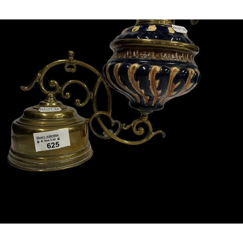 625 - Lamps: Weighted oil lamp with gadrooned pottery blue ground bowl, marked for Kaester & Tobleman.... 